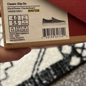NWT girls vans slip on sneakers.  Never worn.  New in box.  Size 5.